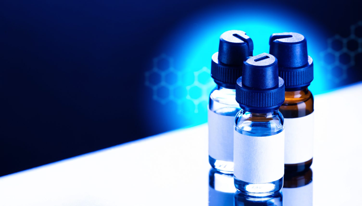 Research peptide vials with cyan lab lighting
